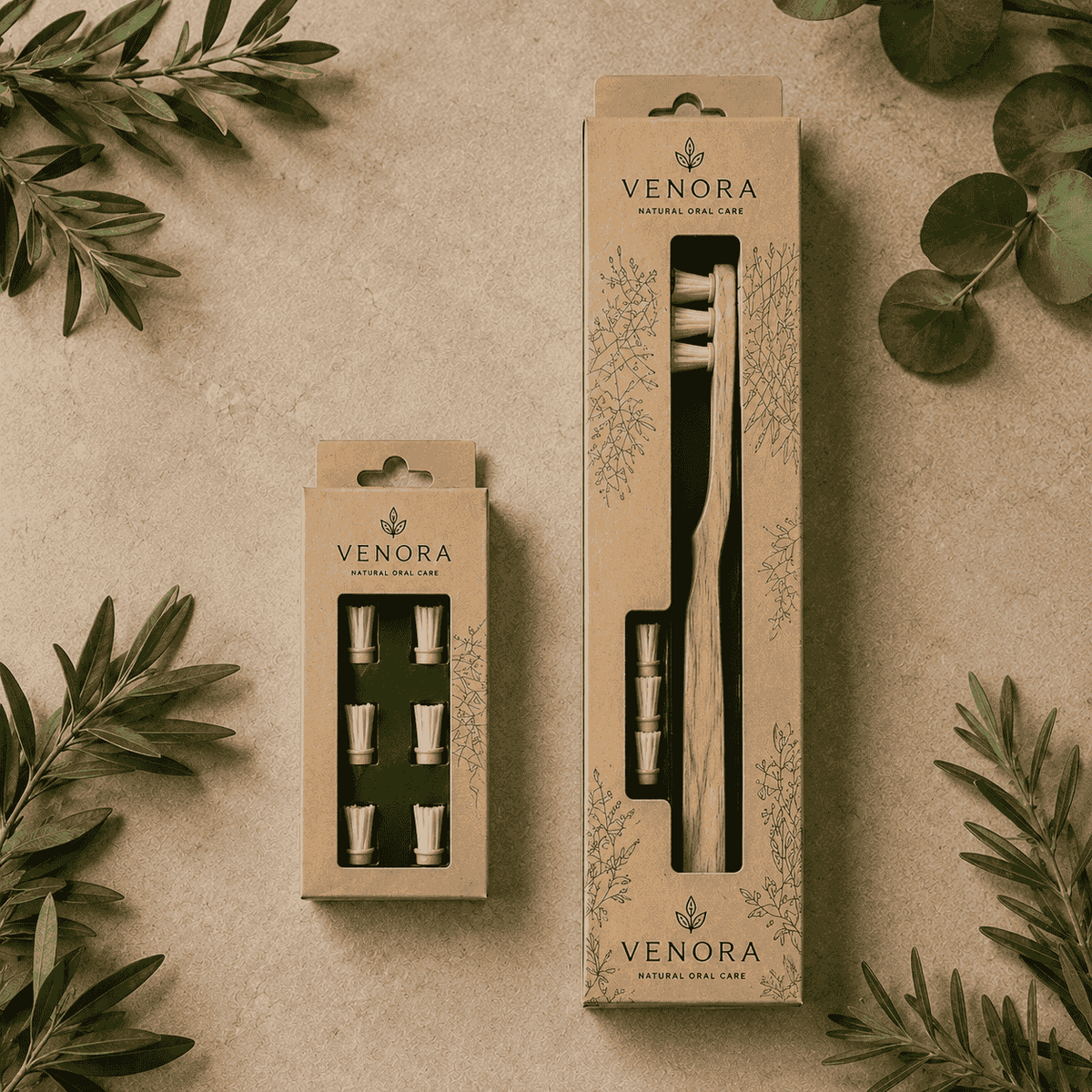 Venora dental care products in packaging on a textured surface with green leaves.